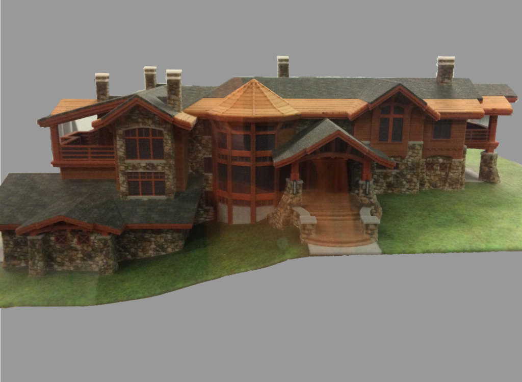 A detailed 3D-printed model of a luxury home with intricate architectural features.