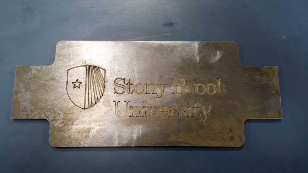 Waterjet-cut metal sign