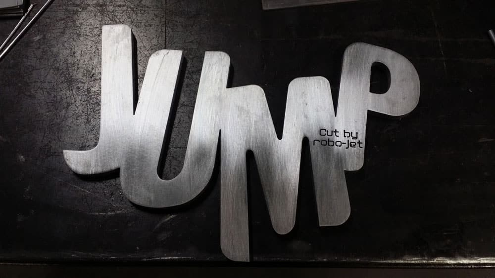 Waterjet-cut metal sign