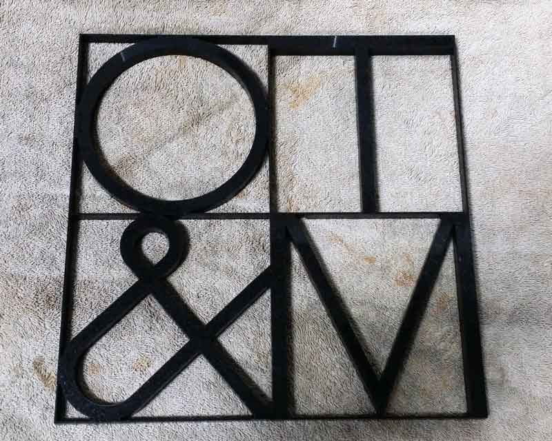 Waterjet-cut metal sign